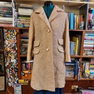 Vintage baby pink mod girly midi length coat.